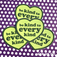 A group of green heart-shaped vinyl stickers with the slogan 'be kind to every kind'. A cute original design by Sick On Sin.