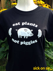 Eat Plants Not Piggies original design on an adult tee by Sick On Sin. Perfect for vegans and vegetarians.
