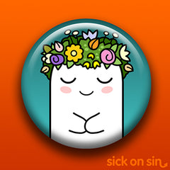 A cute illustration of a ghost wearing a crown of flowers to celebrate summer. Midsommar Ghost is an original design by Sick On Sin available on pins, magnets, keychains, etc.