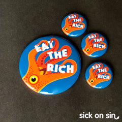 Anti-capitalism slogan design featuring ta squid with the caption Eat The Rich. Original artwork by Sick On Sin available on pins, magnets, keychains, etc.