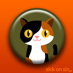 Illustration of a cute calico cat with big yellow eyes. Original design by Sick On Sin available on pins, magnets, keychains, etc.