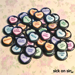Cute, colourful, sweet and sassy Candy Heart original designs by Sick On Sin available on pins, magnets, keychains, etc. Perfect for Valentine's Day and anti-Valentine's day!