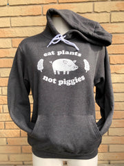 Eat Plants Not Piggies design on a dark grey pullover hoodie sweatshirt by Sick On Sin