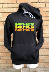 A black pullover hoodie with Plant-Eater slogan. Original retro-inspired design by Sick On Sin.