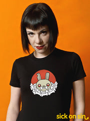 Model wearing a black tee with a graphic of an evil looking brown bunny sitting on a pile of bones. An original design by Sick On Sin.